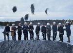 Throwing dirt at the groundbreaking for the Stonecrop Meadows housing project in Middlebury.